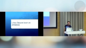 Image of Vitaly Wool presenting a talk on Linux Secure Boot on ARM64